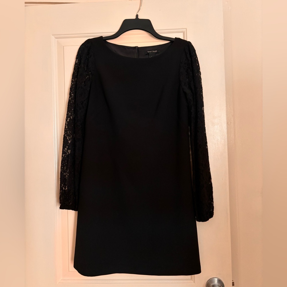 WHBM mini black dress with long lace sleeves. Size 2. Extremely flattering.
